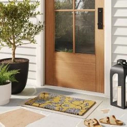Promo ✨ 1'6" x 2'6" Outdoor Floral Door Mat Yellow - Threshold™ 🧨