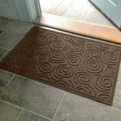 Coupon 🌟 2'x3' Aqua Shield Swirls Indoor/Outdoor Doormat Dark Brown - Bungalow Flooring 🥰