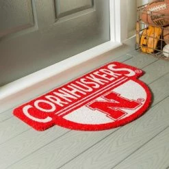 Outlet 🥰 Evergreen University of Nebraska Indoor Outdoor Natural Shaped Coir Doormat 1'6"x2'4" Multicolored 🔔